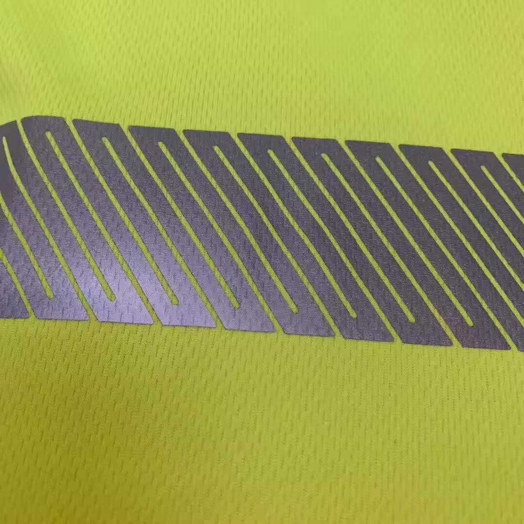 green reflective polo shirt